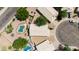 Expansive aerial view showcases the property's pools, landscaping, and neighborhood layout, highlighting desirable curb appeal at 16642 N 35Th Way, Phoenix, AZ 85032