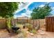 Backyard featuring raised garden beds, gravel ground cover, and desert plants at 16642 N 35Th Way, Phoenix, AZ 85032