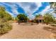 Backyard with a fenced pool area, gravel ground cover, and desert plants at 16642 N 35Th Way, Phoenix, AZ 85032