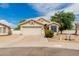 Charming single-story home featuring a two-car garage, desert landscaping, and a welcoming facade at 16642 N 35Th Way, Phoenix, AZ 85032