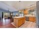 Open kitchen featuring a center island, stainless steel appliances, and a view into the living area at 16642 N 35Th Way, Phoenix, AZ 85032