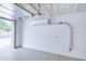 Garage features a mini-split AC, epoxy floor, and access to outside at 2813 E Crescent Way, Gilbert, AZ 85298