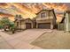 Attractive two-story home with a two-car garage and drought-resistant landscaping at 3054 W Eagle Claw Dr, Phoenix, AZ 85086