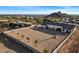 Aerial view of home surrounded by desert landscape with mountain views in the distance at 3323 N 81St St, Mesa, AZ 85207