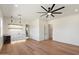 Bright and spacious bonus room featuring a bar area with floating shelves and modern light fixtures at 3323 N 81St St, Mesa, AZ 85207