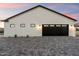 Spacious three car garage featuring a long driveway at 3323 N 81St St, Mesa, AZ 85207