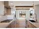 Gourmet kitchen features stainless steel appliances, custom cabinets, and an oversized kitchen island at 3323 N 81St St, Mesa, AZ 85207
