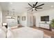 Spacious main bedroom with hardwood floors, stylish wet bar, and lots of natural light at 3323 N 81St St, Mesa, AZ 85207