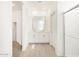 Bright bathroom features double sink vanity, tiled floor, and glass shower at 4151 W Lisa Ln, San Tan Valley, AZ 85144