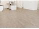 Open-concept area with tile floors provides easy access to kitchen and dining at 4151 W Lisa Ln, San Tan Valley, AZ 85144