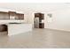 Modern kitchen featuring stainless steel appliances, granite countertops, and an island at 4182 W Lisa Ln, San Tan Valley, AZ 85144