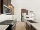 Close up of kitchen with stainless steel appliances and granite countertops at 4182 W Lisa Ln, San Tan Valley, AZ 85144