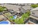 A high-angle view features a private backyard with a pool, patio, and landscaped yard at 4712 E Amberwood Dr, Phoenix, AZ 85048
