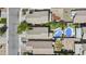An aerial view shows a neighborhood with backyard pools, landscaping, and well-maintained homes at 4712 E Amberwood Dr, Phoenix, AZ 85048