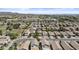An aerial view of a residential neighborhood showing well-maintained houses and green spaces at 4712 E Amberwood Dr, Phoenix, AZ 85048