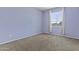 Comfortable bedroom with neutral carpet and a window dressed with white blinds at 4712 E Amberwood Dr, Phoenix, AZ 85048