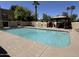 Community pool featuring cool, clear water, a covered gazebo, and comfortable lounge chairs for residents to relax at 500 N Gila Springs Blvd # 230, Chandler, AZ 85226
