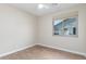 Neutral bedroom with hardwood floors and window letting in natural light at 5381 S Emerald Desert Dr, Gold Canyon, AZ 85118