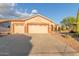 Exterior front view of home with a 3-car garage, low maintenance desert landscaping at 5381 S Emerald Desert Dr, Gold Canyon, AZ 85118