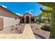 Charming front entrance and desert landscaping at 5381 S Emerald Desert Dr, Gold Canyon, AZ 85118