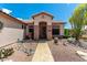 Charming front entrance and desert landscaping at 5381 S Emerald Desert Dr, Gold Canyon, AZ 85118