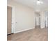 Bright, airy living room featuring hardwood flooring, neutral paint and multiple entry doors at 5381 S Emerald Desert Dr, Gold Canyon, AZ 85118