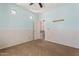 Carpeted bedroom with two-tone walls and access to closet space at 5408 W Allen St, Laveen, AZ 85339
