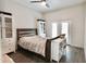 Neutral bedroom with wood floors and double doors at 8863 S Grandview Dr, Tempe, AZ 85284