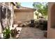 Small front patio area with chairs and potted plants near home at 8863 S Grandview Dr, Tempe, AZ 85284