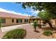 Charming backyard with desert landscaping, a cozy wooden gazebo, and plenty of room for entertaining at 9154 E Caribbean Ln, Scottsdale, AZ 85260