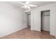 Bedroom with tile floors and a closet with sliding doors at 9154 E Caribbean Ln, Scottsdale, AZ 85260