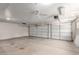 Spacious two car garage featuring two single car garage doors at 9154 E Caribbean Ln, Scottsdale, AZ 85260