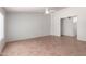 Spacious living room with tile flooring, neutral walls, and a bright, airy feel at 9154 E Caribbean Ln, Scottsdale, AZ 85260