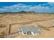 A desert community shows large lots with block fences and newly constructed single-Gathering homes at 9486 W Sandstone Mountain Dr, Casa Grande, AZ 85194