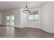 Open dining area with modern chandelier and large windows providing natural light at 9486 W Sandstone Mountain Dr, Casa Grande, AZ 85194