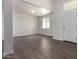 Open-concept living space with tile flooring, large windows and natural light at 9486 W Sandstone Mountain Dr, Casa Grande, AZ 85194