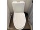 Modern toilet in a bathroom with a black and white accent wall at 9827 N Desert Rose Dr, Fountain Hills, AZ 85268