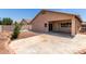 Backyard offers concrete patio and low-maintenance gravel landscaping at 12238 W Monroe St, Avondale, AZ 85323