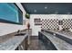 Entertain in style with this expansive bar area, complete with sink, and pool viewing window at 13209 N 17Th Pl, Phoenix, AZ 85022
