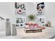 Stylishly decorated dressing room island with designer books and modern decor at 13209 N 17Th Pl, Phoenix, AZ 85022