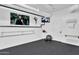 Bright home exercise room with ballet barres, exercise equipment, and television for fitness at 13209 N 17Th Pl, Phoenix, AZ 85022