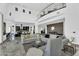 Expansive living room with soaring ceilings, contemporary furnishings, and abundant natural light at 13209 N 17Th Pl, Phoenix, AZ 85022