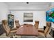 Contemporary office space with a large conference table, leather chairs, and a wall-mounted TV at 13209 N 17Th Pl, Phoenix, AZ 85022