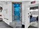 Modern safe room with stone shower, custom door, and interior decorations at 13209 N 17Th Pl, Phoenix, AZ 85022