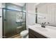 Modern bathroom boasts a glass-enclosed shower with subway tile and dark fixtures at 13503 W Calle De Baca --, Peoria, AZ 85383