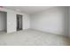 Unfurnished bedroom with carpet and a view to the bath at 13503 W Calle De Baca --, Peoria, AZ 85383