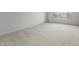 Large bedroom with neutral carpet and a bright window at 13503 W Calle De Baca --, Peoria, AZ 85383