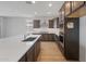 Modern kitchen features a large center island, stainless appliances, and designer finishes at 13503 W Calle De Baca --, Peoria, AZ 85383
