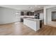 Open-concept kitchen with a spacious island, stainless steel appliances, and ample cabinet space at 13503 W Calle De Baca --, Peoria, AZ 85383