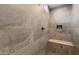 Walk-in shower with tile surround, built-in bench, and soap niche at 13503 W Calle De Baca --, Peoria, AZ 85383